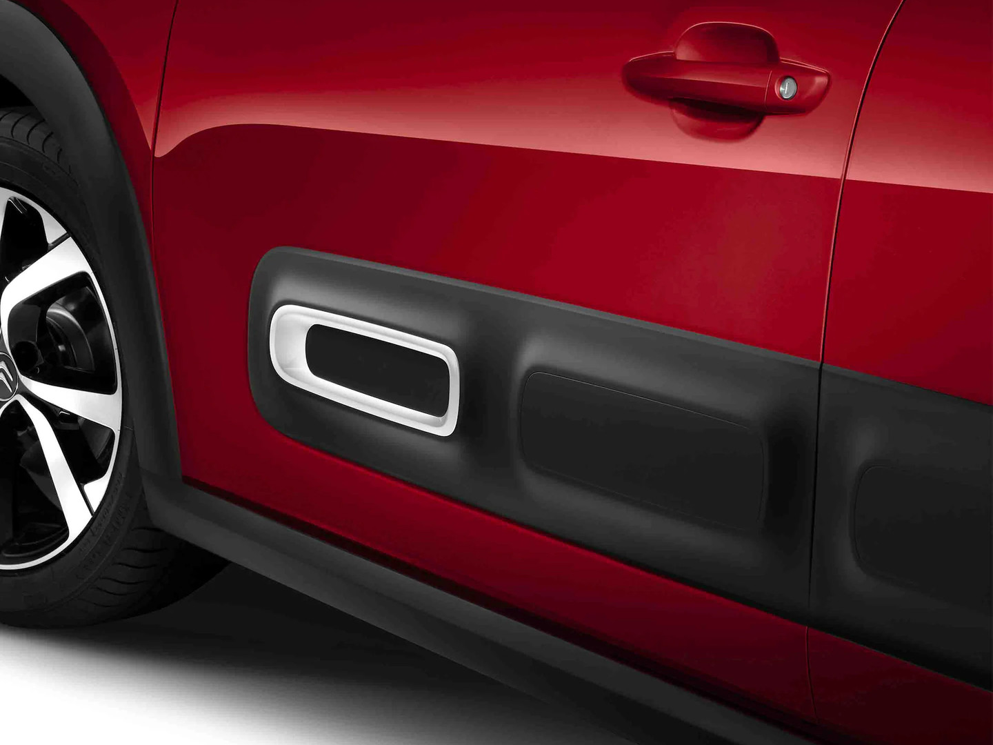 Zoom sugli Airbump® di una Citroën C3 di colore Elixir Red